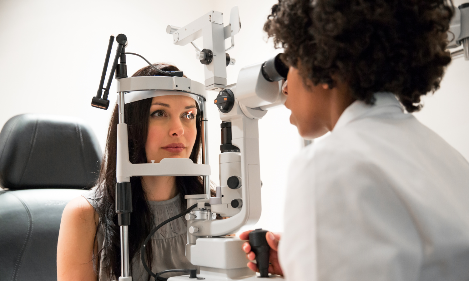 Woman having eye exam near me